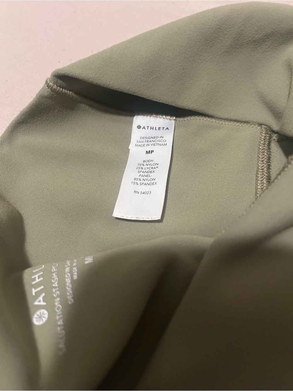 Athleta Olive Green Cropped Leggings with Side Cutout Detail - Picture 10 of 10